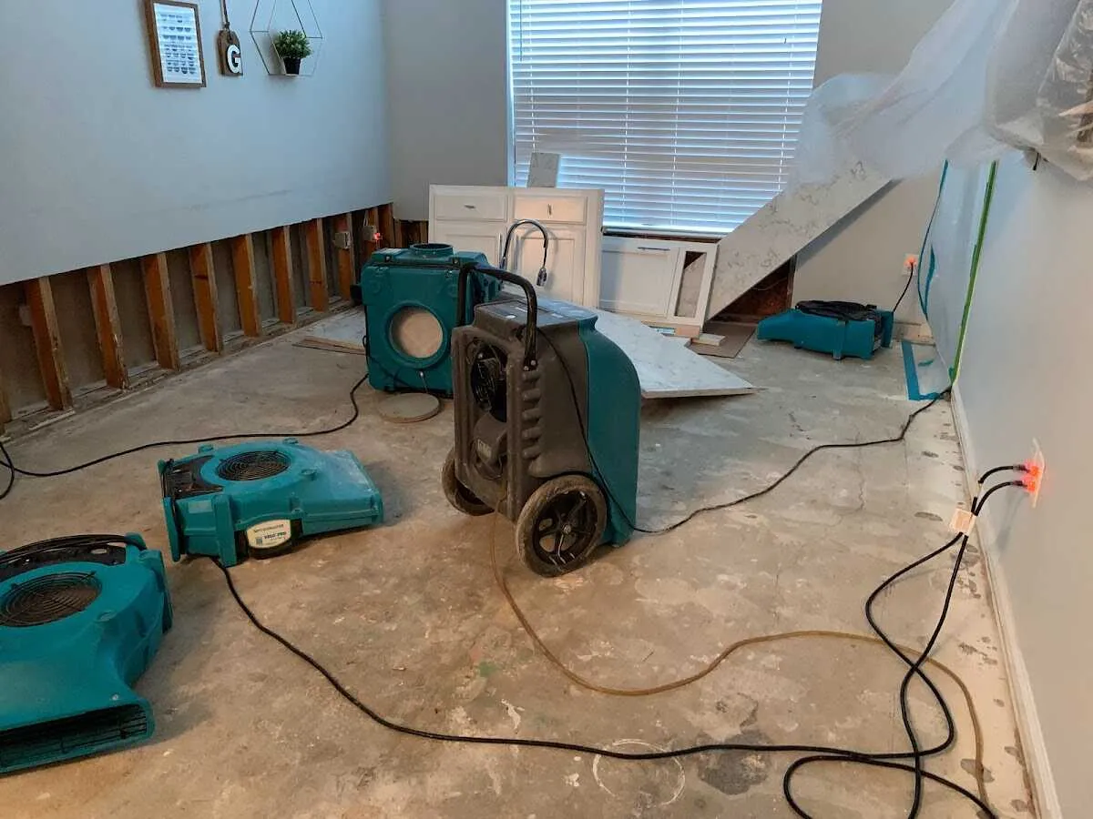 Dehumidifier in flood-cut room for Water Damage Restoration in Tehaleh